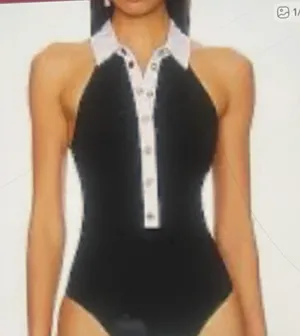Seatyrocks Elevate your style with this chie black and white bodysuit. Perfect for any occasion, it features a sophisticated button- up design thumbnail 1
