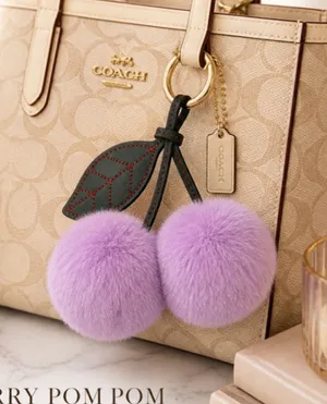 NEW Cherry Pom Pom Bag Charm Keychain Purple Faux Fur NWT thumbnail 1