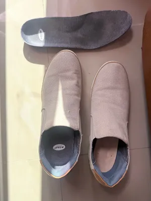 Dr. Scholl's "If Only" wedge slip-on sneakers in a light gray perforated suede material. thumbnail 12
