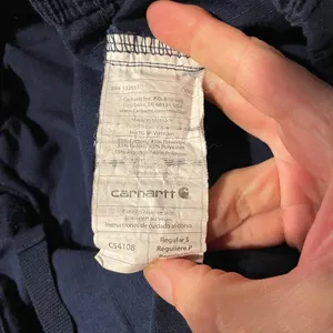 Cute navy Carhartt broken in work cargo pants pink orange trim chore thumbnail 8
