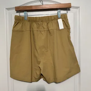 Fabletics Women Tan Khaki Athletic Running Shorts, Zipper‎ Pocket 5 Inch Inseam thumbnail 6