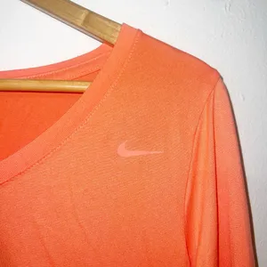 Nike Orange “the Nike tee” athletic cut Dri-fit long sleeve v neck tee thumbnail 3