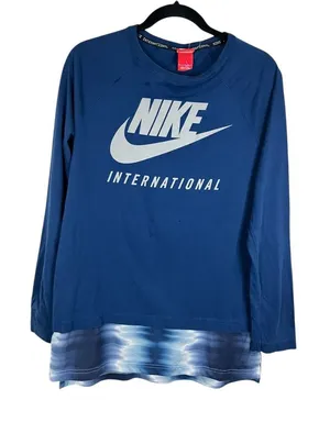 Nike International Women's Long Sleeve Graphic Top Blue Layered Hem - Size Large thumbnail 1
