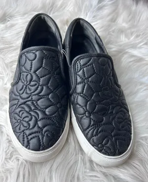 Tory Burch Quilted Slip-On Shoes size 7.5 women’s sneakers comfy black white thumbnail 1