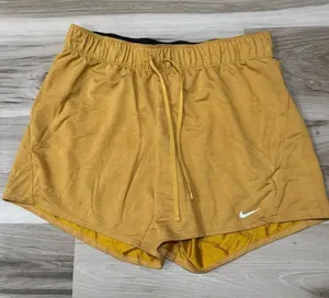 Nike Dri Fit Mustard Yellow Athletic Shorts Women’s Medium thumbnail 1