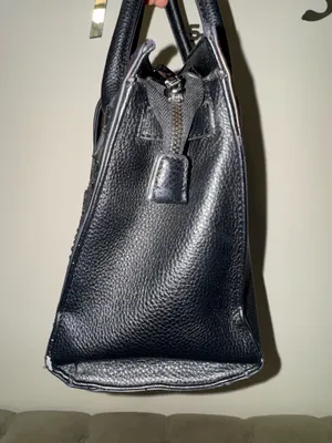 Women’s black handle bag with metal design in the front thumbnail 4