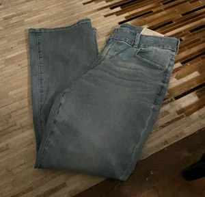 American eagle jeans. These are light in color boot cut and size 14 thumbnail 1