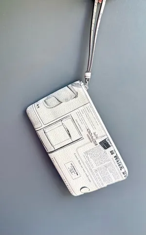 NWT Coach Large Corner Zip Wristlet in Vintage Newspaper Print thumbnail 12