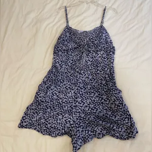 Navy Floral Romper Size L thumbnail 1