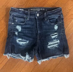 American Eagle Next Level Stretch Distressed Jean Shorts thumbnail 1