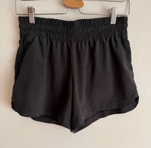 REI Co-op Swiftland Running Shorts Black Smocked Waist Pockets Liner Extra Small thumbnail 1