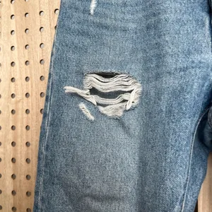 Levi’s 501 Original Straight Jeans – Distressed Light Wash thumbnail 4