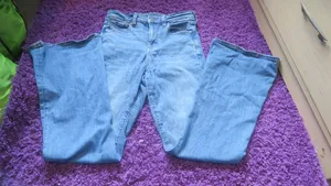 American Eagle Outfitters next level stretch super hi-rise flare jeans in medium wash blue size 4. thumbnail 2