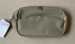 Lululemon City Essentials Pouch Mini - Raw Linen thumbnail 1