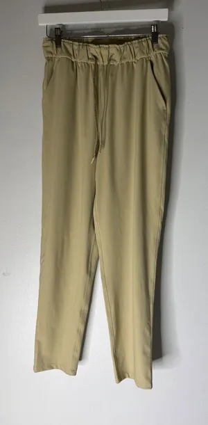 Lululemon On the Fly 7/8 Pant Luxtreme Khaki Tan Jogger Size 6 thumbnail 1