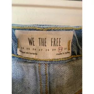 We the Free | Light Wash Distressed Button-Up Denim Mini Skirt Size 30 thumbnail 5
