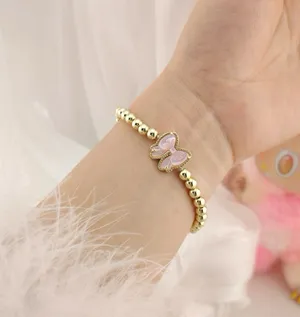 Kendra Scott Haley Bow Gold Stretch Bracelet thumbnail 1