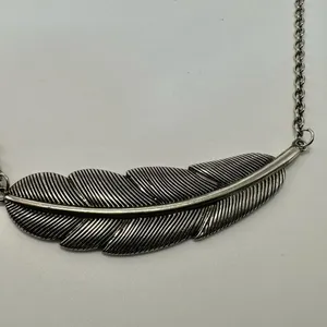 Silver tone feather pendant necklace thumbnail 4