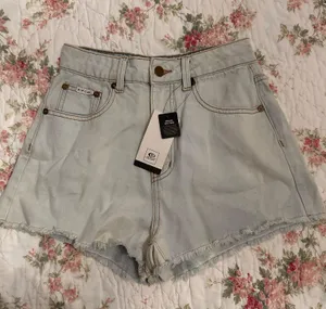 NWT denim shorts distressed rip curl thumbnail 1