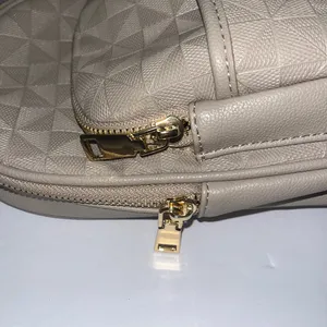Leathered Cream Sling Crossbody Bag with Gold Accents thumbnail 4