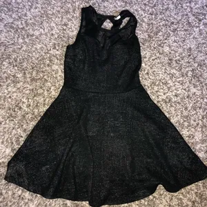 Black dress with gold accents thumbnail 1