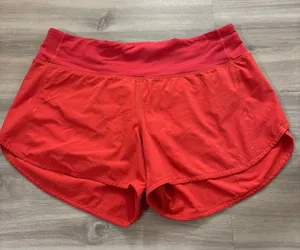 Lululemon Speed Up Mid-Rise Lined Short 4" Solar Orange Women Size 8 thumbnail 1