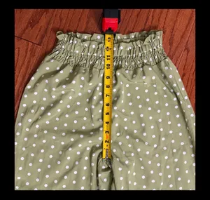 Shein Olive Green high waste Polk dot wide leg pants - Size Small with Bag. Gently warn once and excellent condition. Measurements approximately 12” waste not fully stretched out from elastic waste band x 12” rise x 43” long. None smoking home. Priced to sell at as is condition. Don’t like my price, make reasonable offer. thumbnail 6