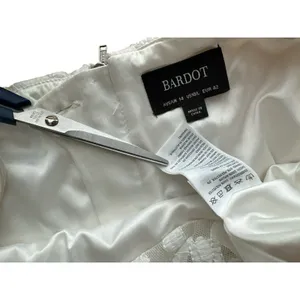 Bardot white lace midi dress Scalloped Vneckline with afitted sheath silhouette. thumbnail 14