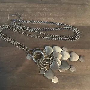 Long gold tone tiered hearts tassel necklace thumbnail 3