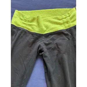 Rubber Doll Womens Flare Yoga Pants Neon Yellow Smocked Waist Athletic Trousers thumbnail 6