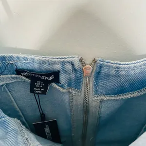 PrettyLittleThing denim mini dress with a sculpted corset-inspired fit thumbnail 6