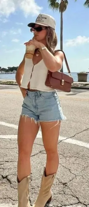 Levi's | 501 Original 100%‎ Cotton Cut Off Raw Hem Jean Shorts in Medium Blue thumbnail 1