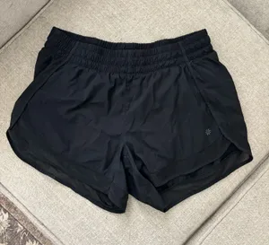 Athleta Mesh Racer Shorts 4" Run Shorts thumbnail 1
