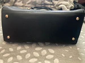 Black handbag/crossbody with red and white stipe Cheetah print interior design Plenty of zippers thumbnail 6