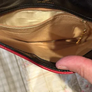 Gucci vintage crossbody bag black with red trim. Beautiful inside has wear shown thumbnail 3