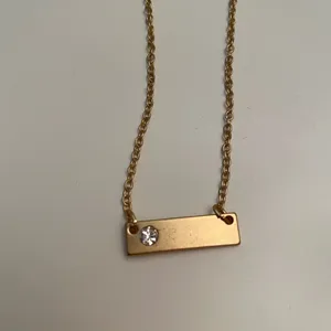 Gold and rhinestone bar necklace thumbnail 3