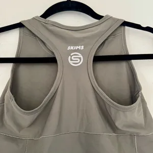 SKIMS Performance Racerback Tank Gunmetal thumbnail 6