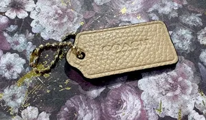 Coach Leather Hang Tag Key Charm Tan Color With Gold Hardware thumbnail 1