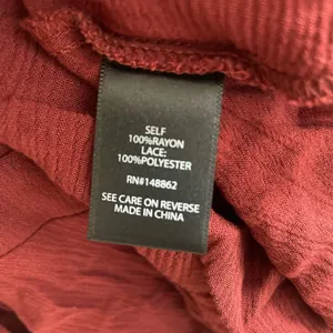 TORRID Crinkle Gauze Lace Inset Surplice Top Tie Wrap in Madder Brown Size 1 thumbnail 9