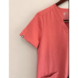 FIGS Women's Casma Three-Pocket Scrub Top In Coral Size XS/P thumbnail 4