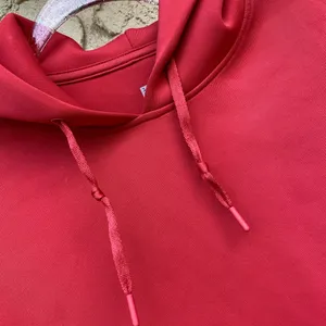 Uniqlo Size medium red hoodie slightly cropped dry fit thumbnail 4
