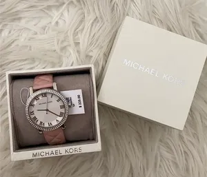 MOVING SALE! Blush pink and silver Michael Kors watch thumbnail 1