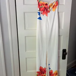 White maxi strapless floral print dress with blue, orange, and yellow hues thumbnail 2