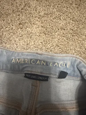 American eagle light wash next level stretch mid rise jean shorts size 12 thumbnail 4