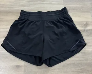 Lululemon Hotty Hot Short High-Rise Long 4" Women Size 4 Black thumbnail 1