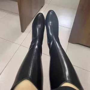 Classic Black Knee-High Women's Riding Boots thumbnail 1
