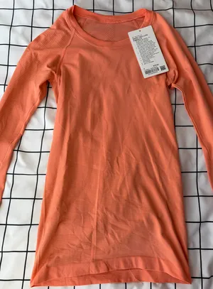 Lululemon Woman’s Coral Long Sleeve Swiftly Tech, Size 2, Hip Length. thumbnail 2
