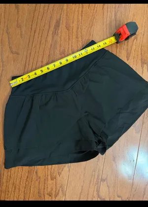 Black Athletic Flowy Activewear Workout Shorts - Size Medium. Gently warn and excellent condition. Under shorts with pockets. Measurements approximately 14” waste, not fully stretched out x 13.5” long. Non-smoking home. priced to sell at as is condition. Don’t like my price, make reasonable offer! And thank you for checking my closet. thumbnail 6