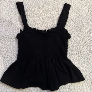 Black ruffle tank top thumbnail 1
