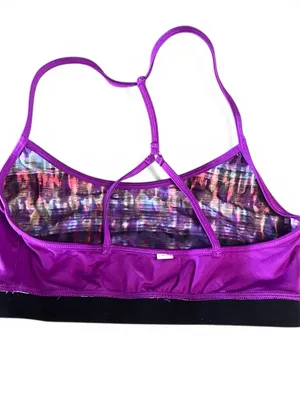 Alo Yoga racerback Spark sports bra featuring a purple abstract print thumbnail 13